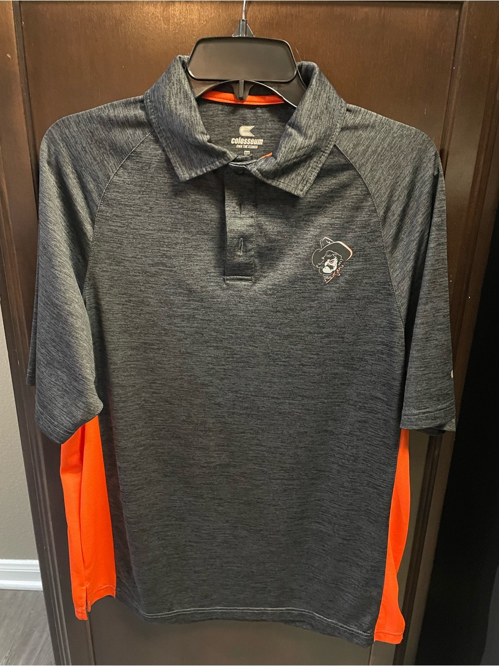 Colosseum Charcoal Heather Polo with Orange Side Panels and Pistol Pete logo